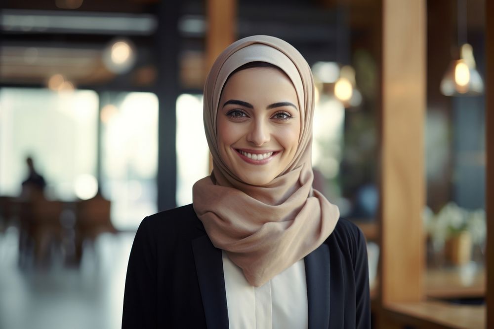 A happy Middle east woman coffee shop owner scarf smile face.