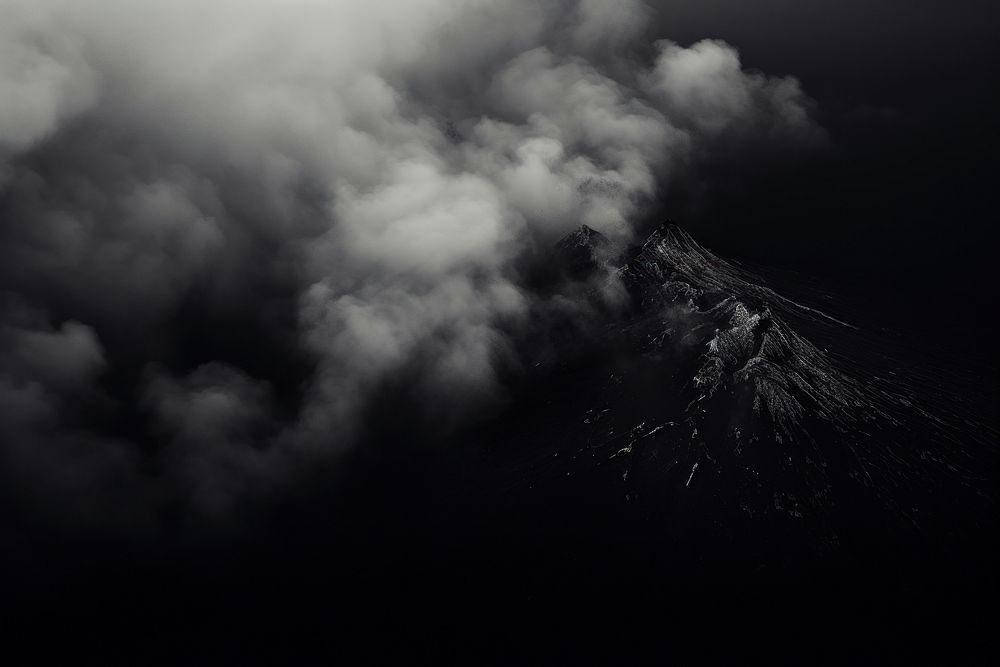 Dark background monochrome mountain outdoors.