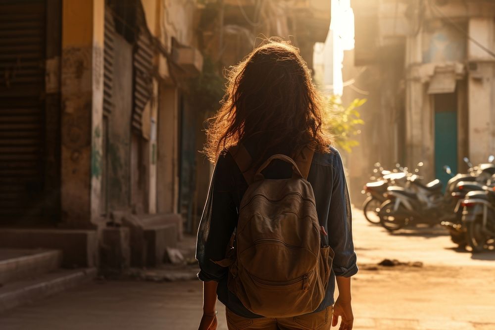 Indian women backpacker sunlight walking travel.