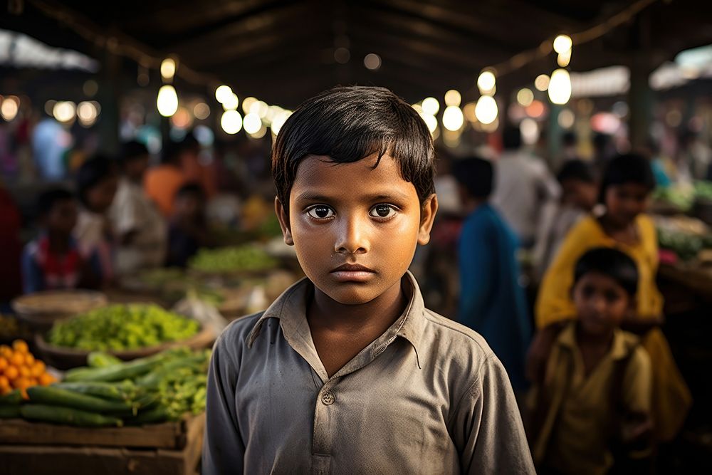 Young South Asian boy market portrait adult.