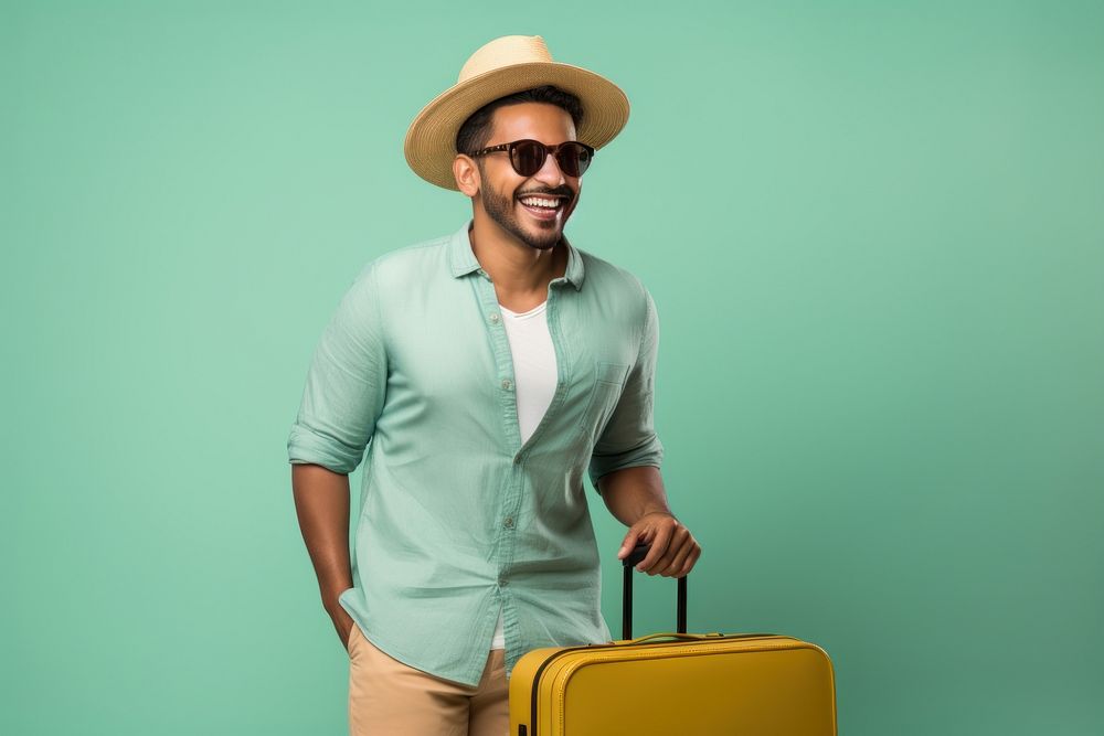 South asian man suitcase cheerful vacation.