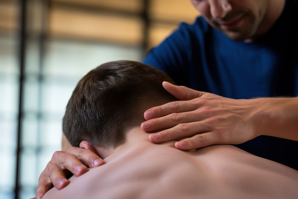 Physiotherapist massaging patient sports relaxation.