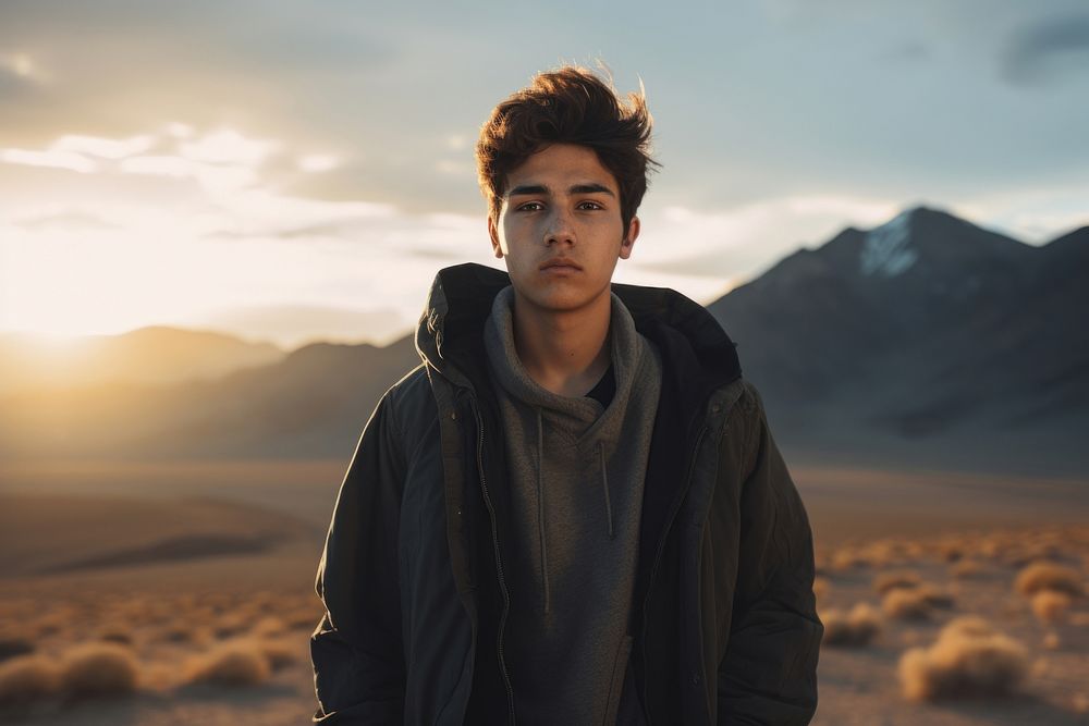 Teenager south asian man mountain portrait outdoors.