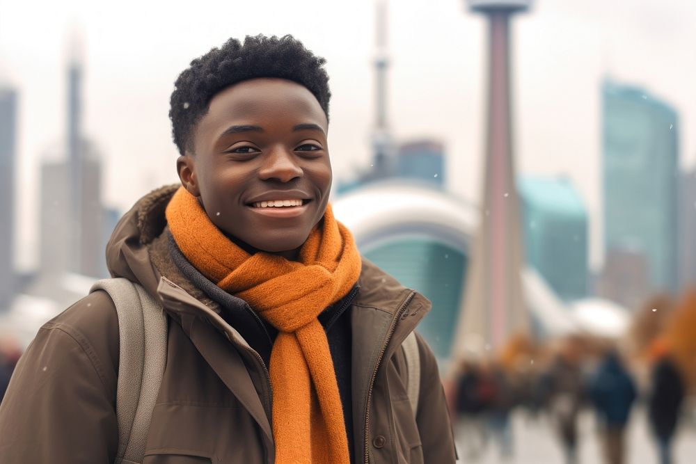 A African exchange student in Toronto smile scarf happy.