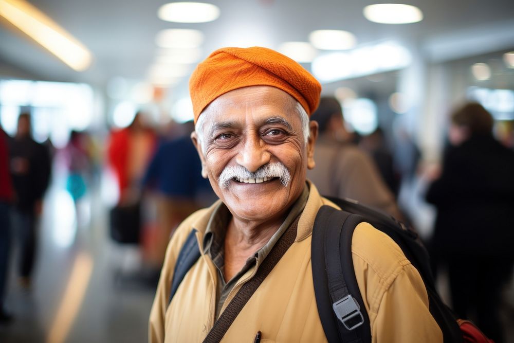 Elderly South Asian man portrait cheerful smiling.