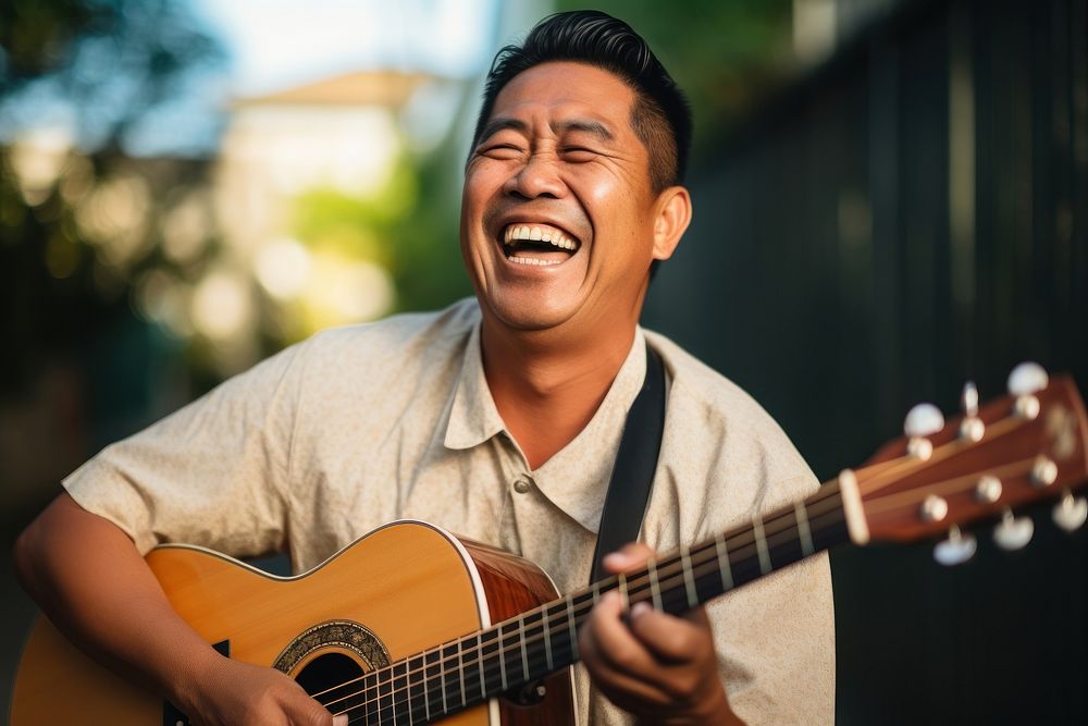 Filipino musician laughing portrait. | Premium Photo - rawpixel