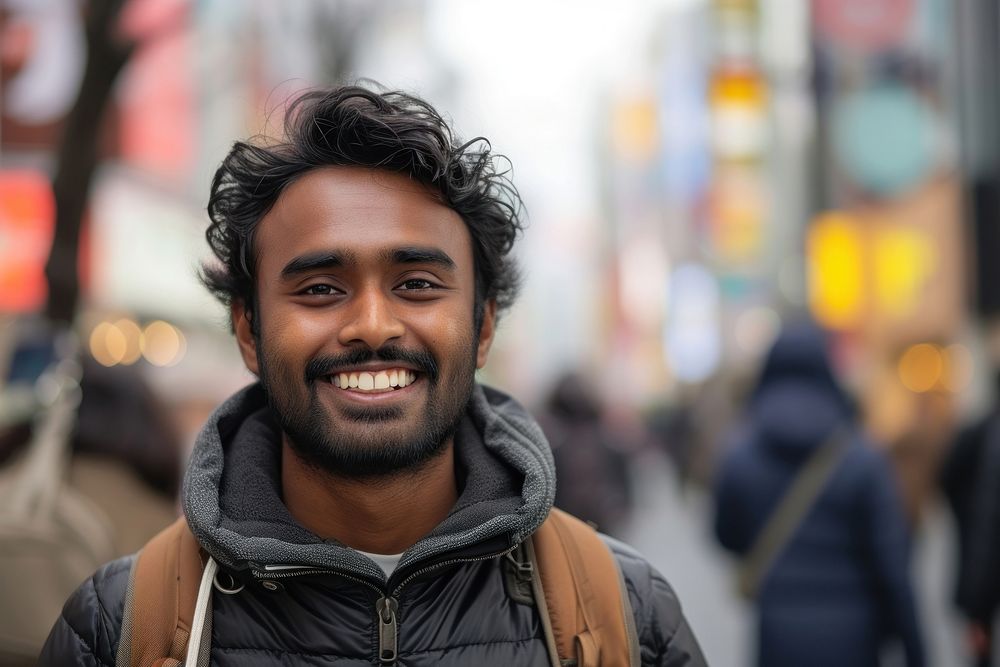 Indian man smiling travel street.