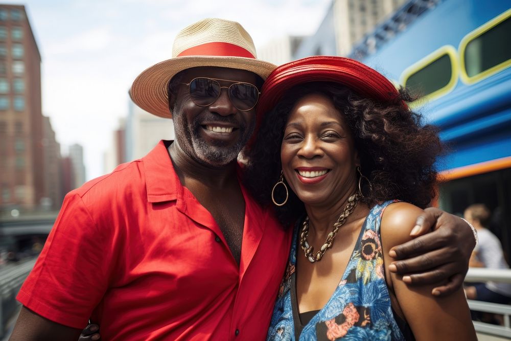 Middle-aged African couple photography laughing portrait.