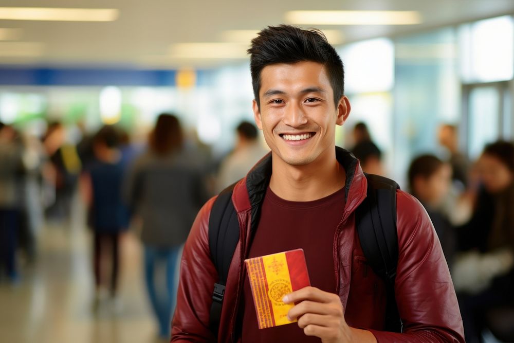 Bhutanese man with passport document smiling travel.