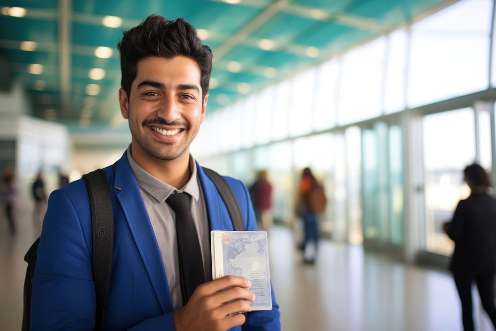 Indian man with passport document smiling travel.