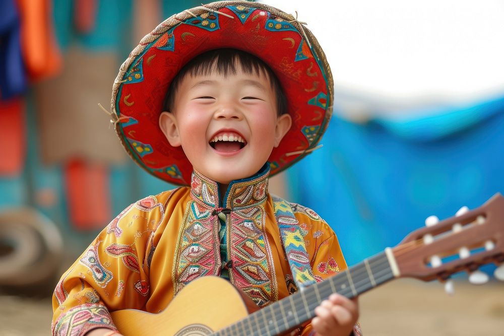 Little singer Mongolia boy laughing musician happy.