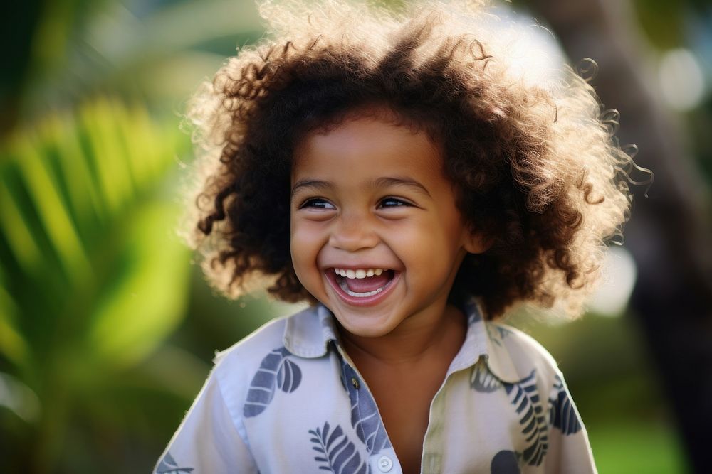 Samoan kid laughing child smile.