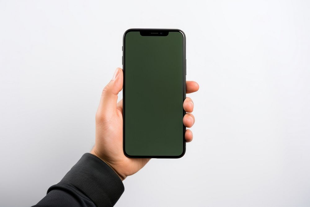 Smart phone holding green hand.