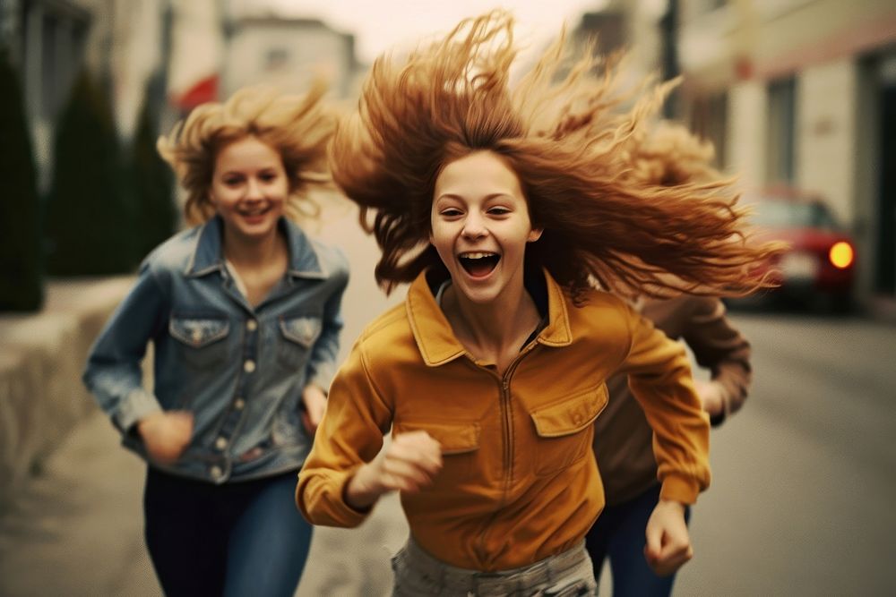 Running teenage people laughing portrait street. AI generated Image by rawpixel.