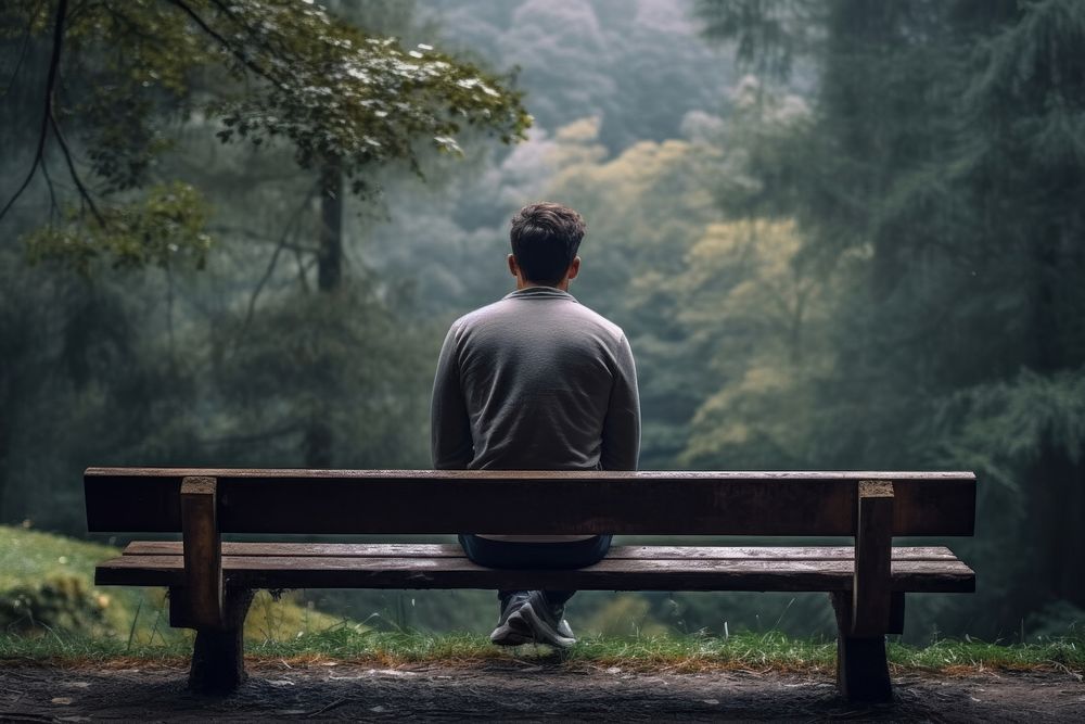 Anxiety sitting bench adult. AI generated Image by rawpixel.