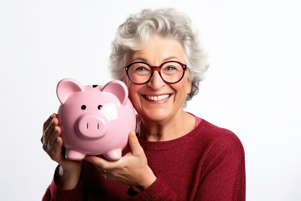 Woman holding his piggy bank adult retirement investment.