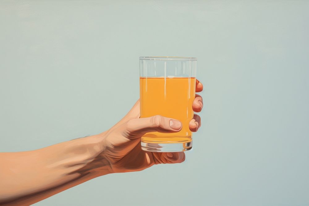 Hand holding orange juice glass drink tin refreshment.