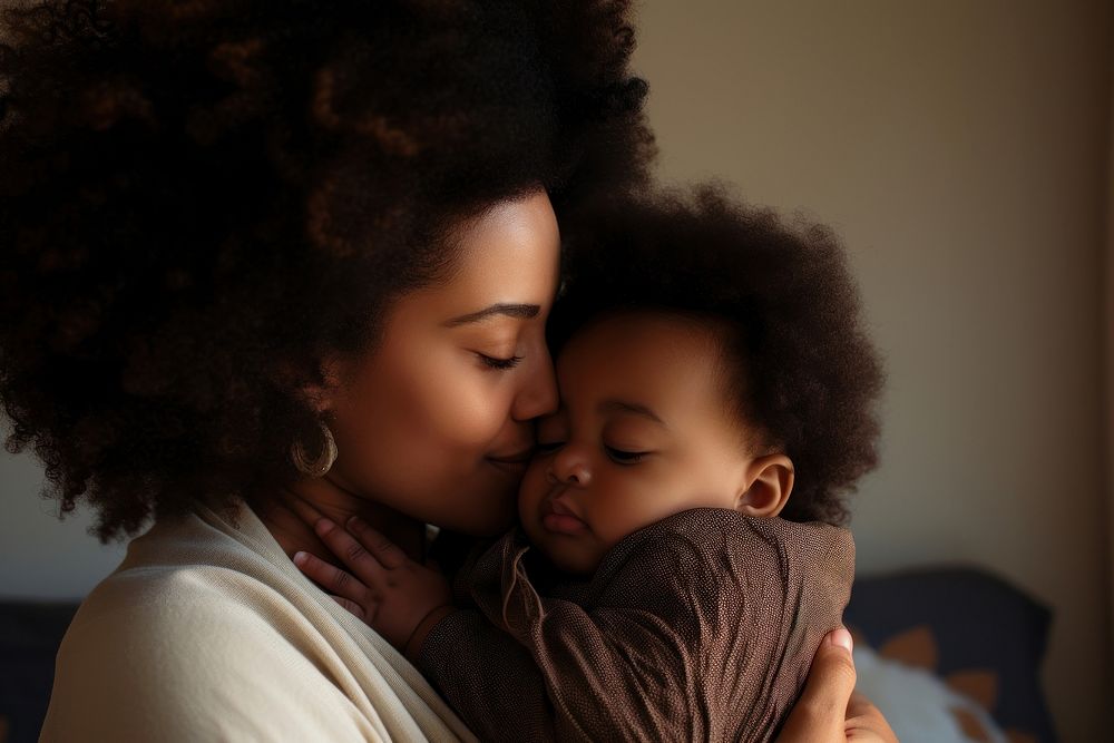 Woman kissing her baby boy portrait hugging adult. AI generated Image by rawpixel.