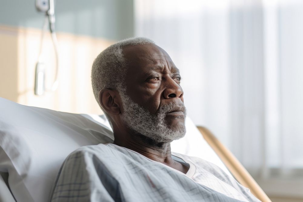 Black senior man sitting on hospital bed recovery medical adult. AI generated Image by rawpixel.