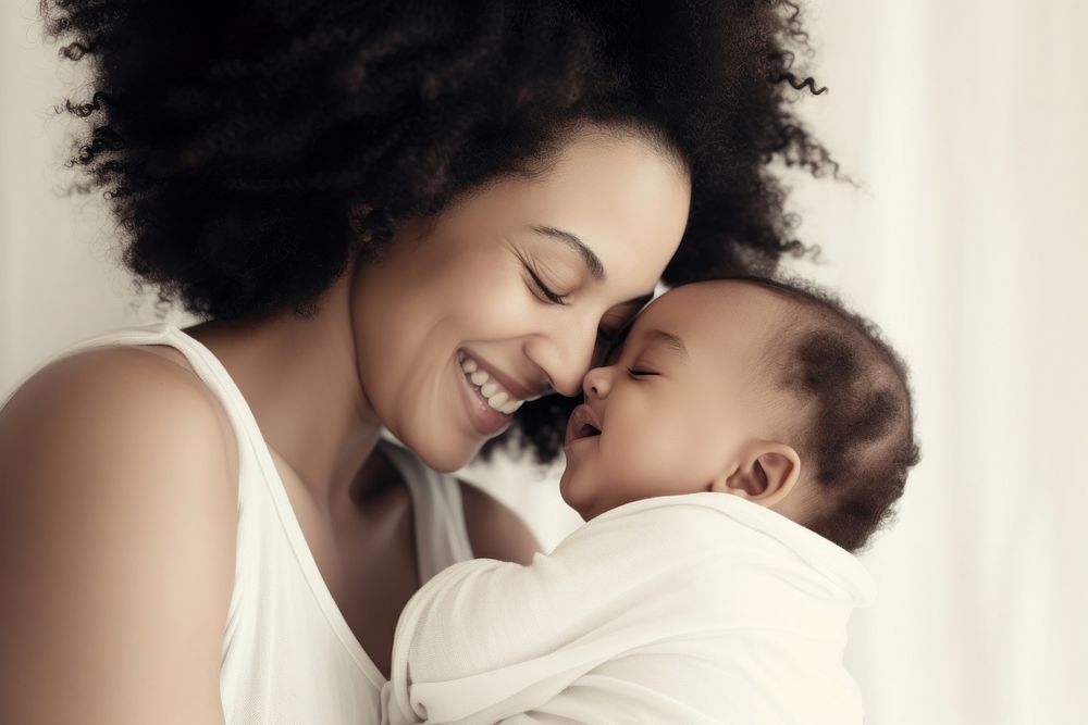 Woman kiss on her baby boy head portrait newborn smiling. AI generated Image by rawpixel.