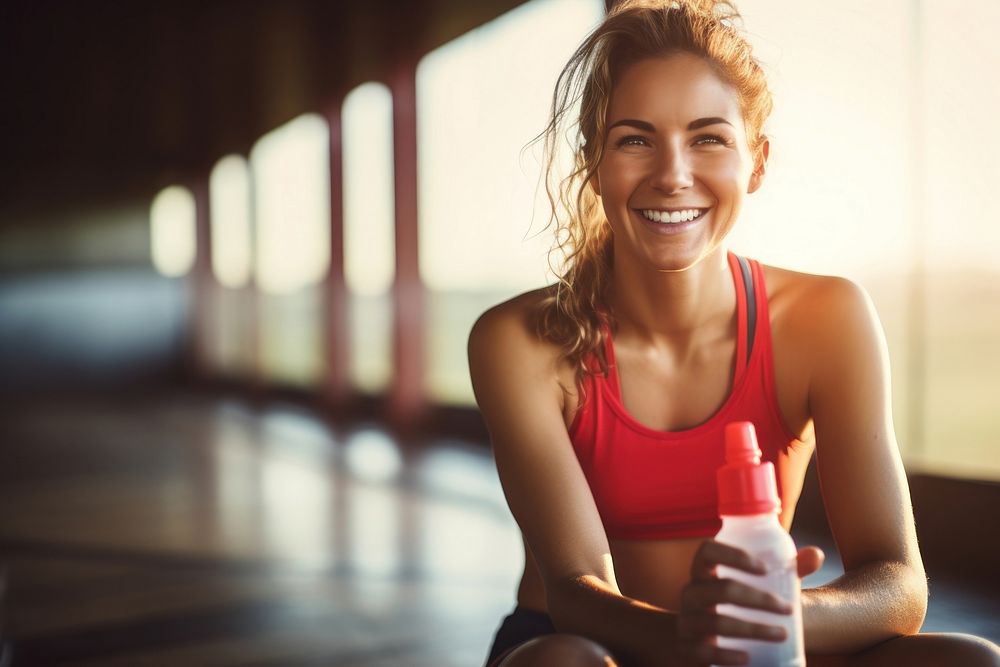 Woman hands in sport wear holding sport water drink laughing smiling sports. AI generated Image by rawpixel.