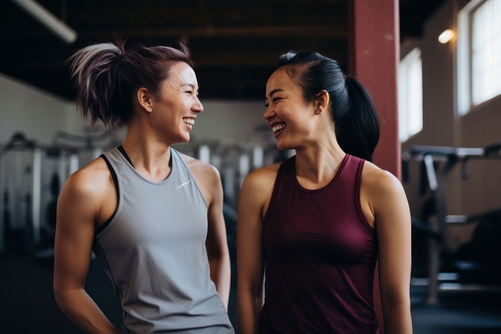 Female friends in sportswear laughing standing smile. AI generated Image by rawpixel.