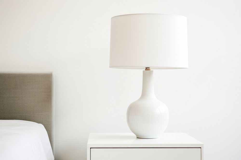 Bedside table lamp bed lampshade furniture. AI generated Image by rawpixel.