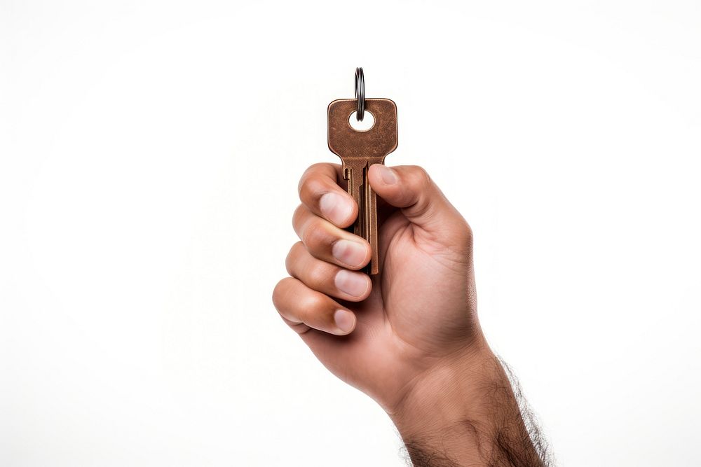 A man holding key white background finger person.