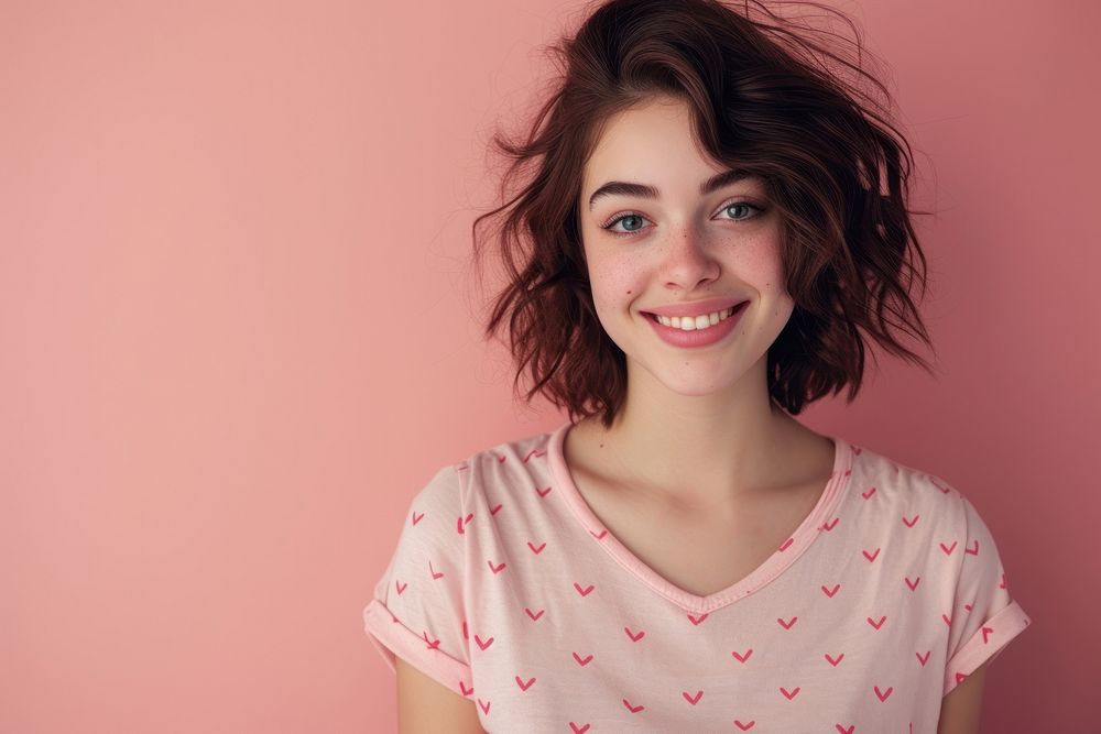 Woman wearing heart-shaped matching shirts smiling smile individuality.