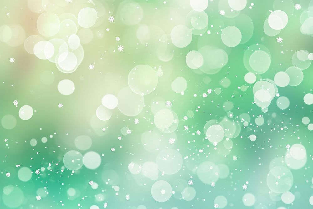 Circle bokeh with snowflake green backgrounds outdoors.