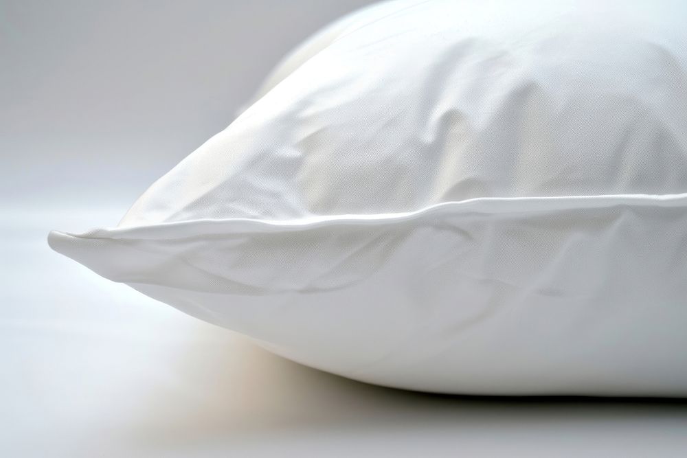 Pillow white crumpled textile.