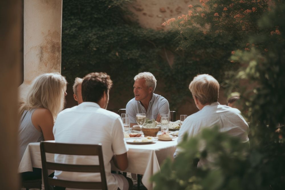 Friends dining in the garden outdoors adult food. AI generated Image by rawpixel.