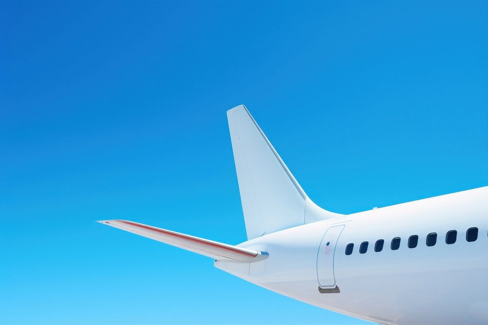 Close up photo of blank white airplane aircraft airliner vehicle.