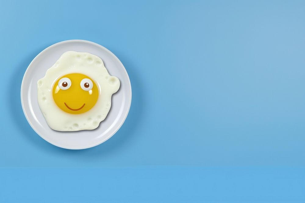  Fried egg plate food blue. AI generated Image by rawpixel.