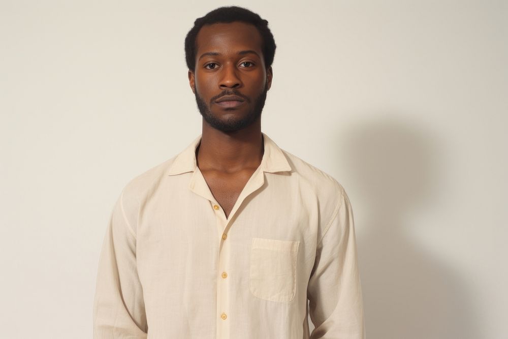 A portrait of black man shirt sleeve adult.