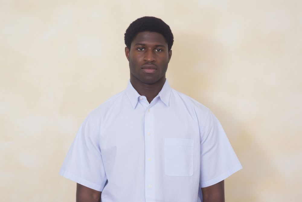 A portrait of black man shirt adult white.