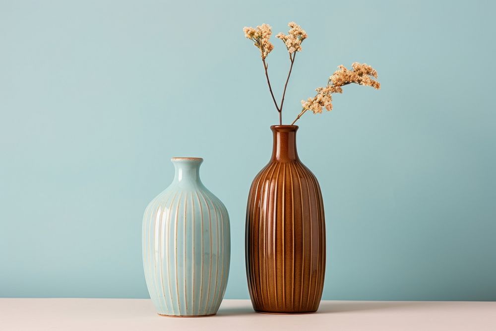 Vases on a beige pottery flower blue.