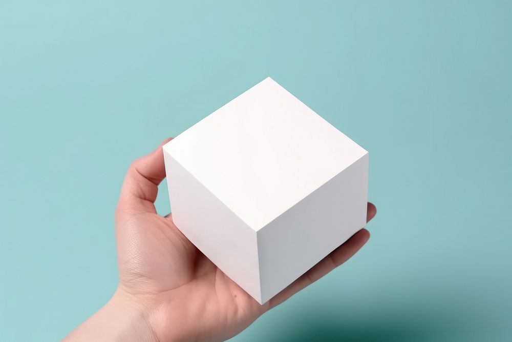 Gift box holding paper white.
