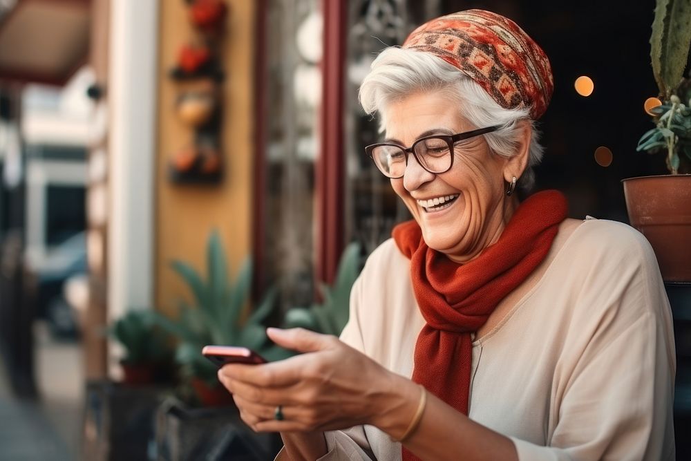 Smartphone glasses smiling adult.
