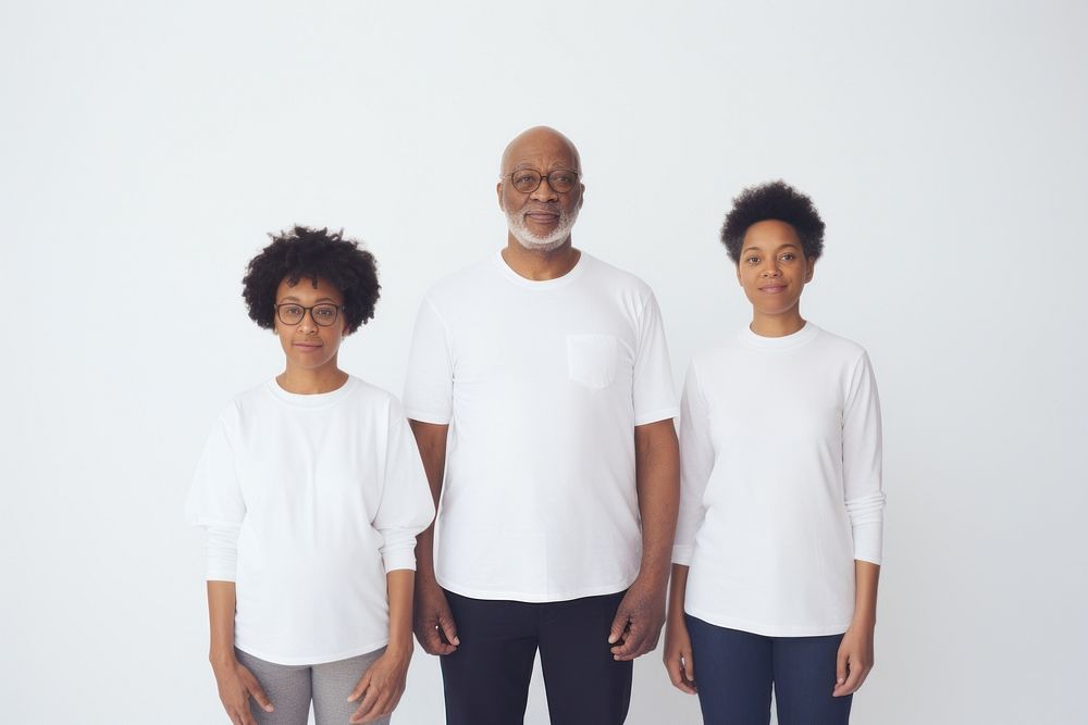 Black family wearing blank white shirt poses at studio for portrait pictures t-shirt glasses parent.