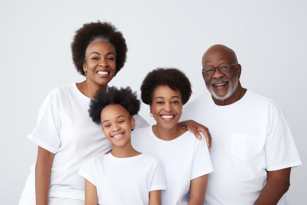 Black family wearing blank white shirt poses at studio for portrait pictures grandparent adult photo.