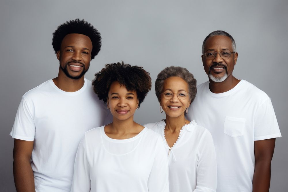 Black family wearing blank white shirt poses at studio for portrait pictures t-shirt parent adult.
