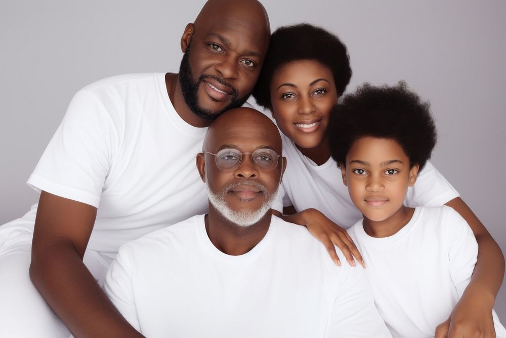 Black family wearing blank white shirt poses at studio for portrait pictures grandparent adult photo.