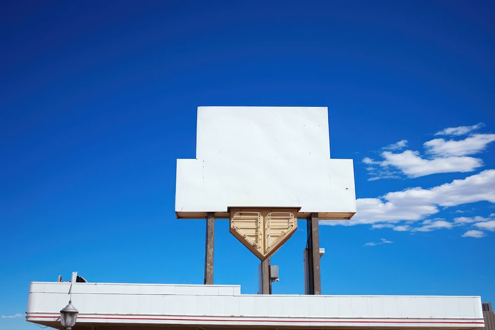 Blank white retro 1960s restaurant sign in las vegas sky architecture outdoors.