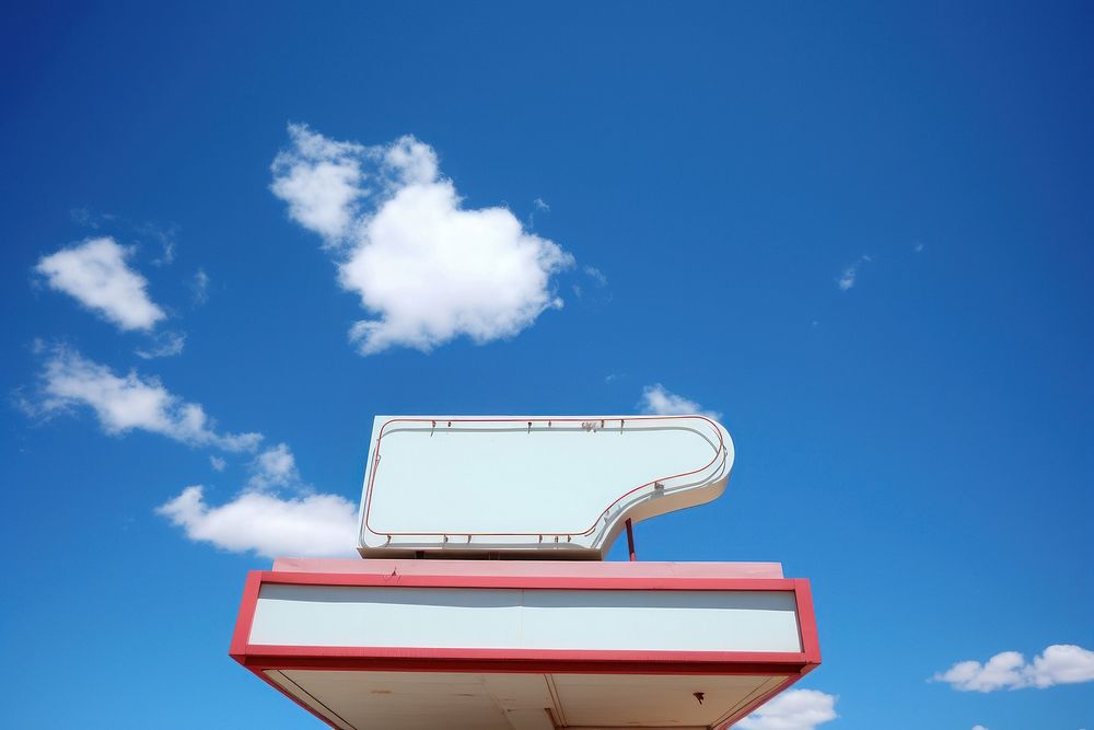 Blank white retro store sign sky architecture outdoors.