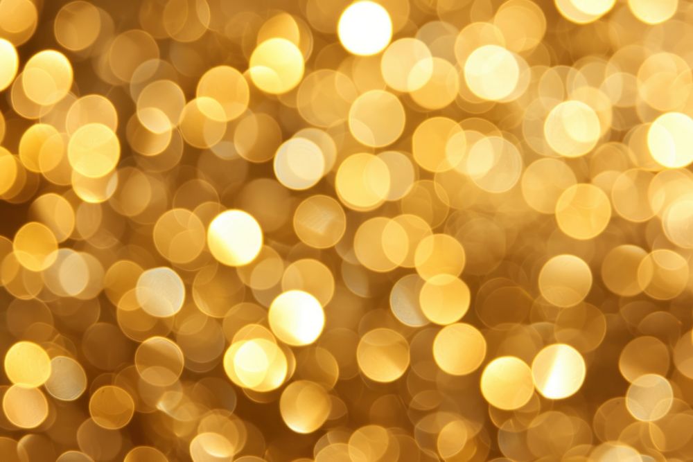 Golden bokeh backgrounds lighting glitter.
