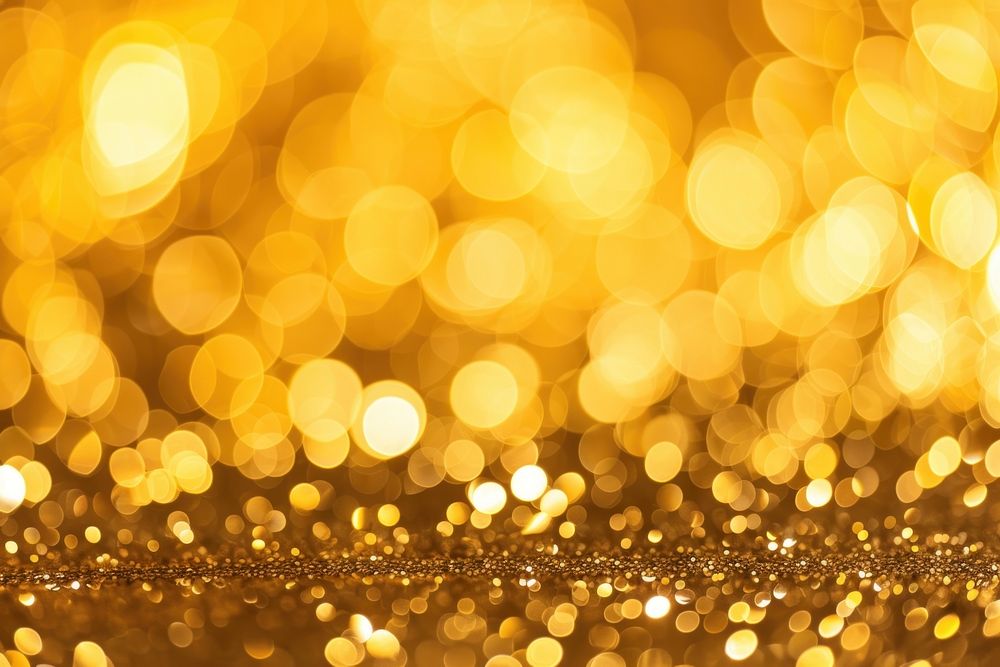 Golden bokeh backgrounds glitter illuminated.