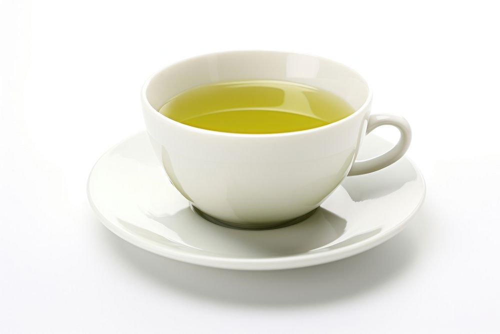 Green tea in the cup saucer drink mug.