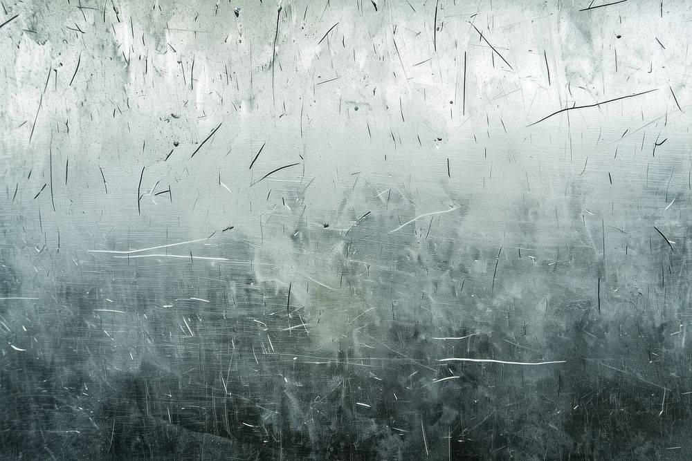 Scratches and dust on the glass backgrounds texture gray.