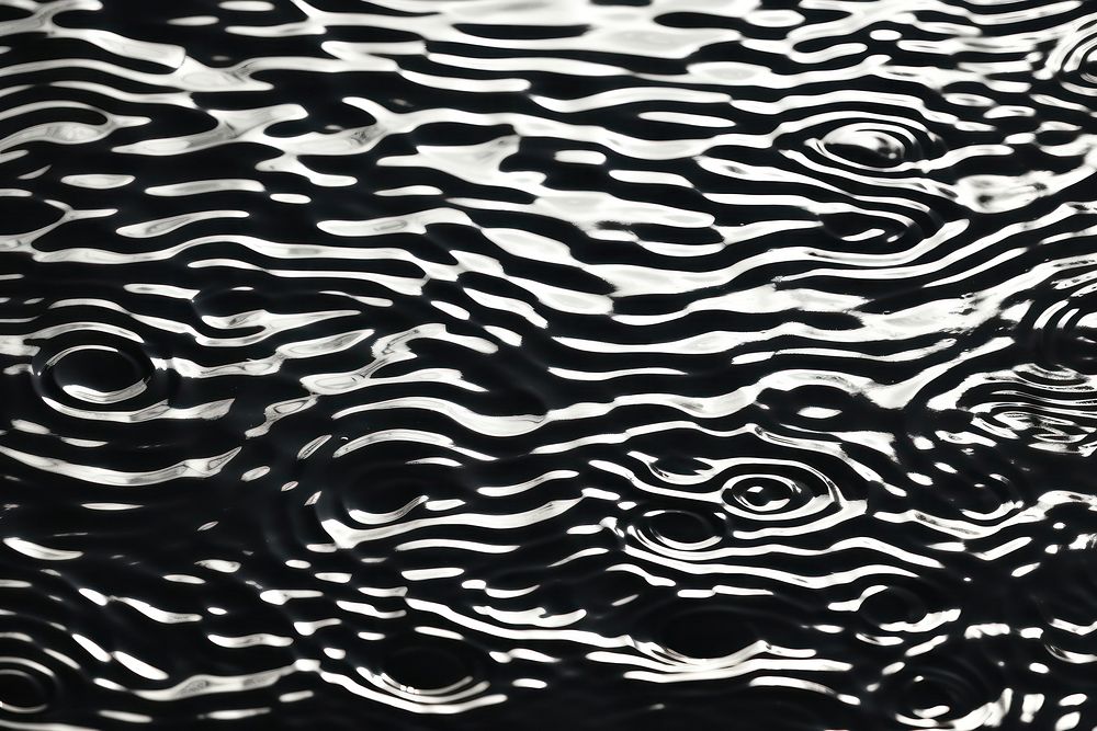 Black and white abstract pattern backgrounds ripple water.